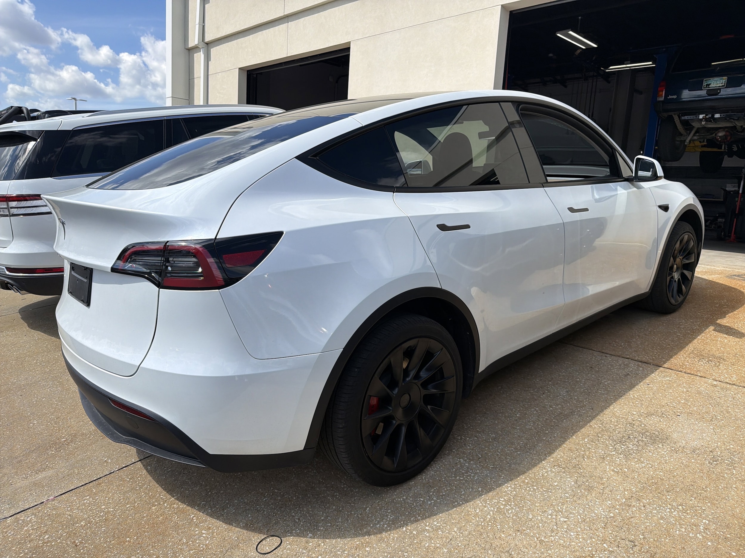 Used 2025 Tesla Model Y Long Range with VIN 7SAYGDED4SF261446 for sale in Northfield, Minnesota
