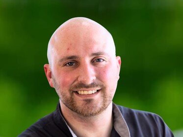 Staff member Caleb Gibbs from ID_ea5dd53777b6
