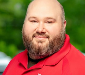 Staff member Nikolas McCarthy from ID_801d555e7498