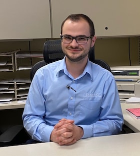 Staff member Austin Mckenzie from d2126ecd240a