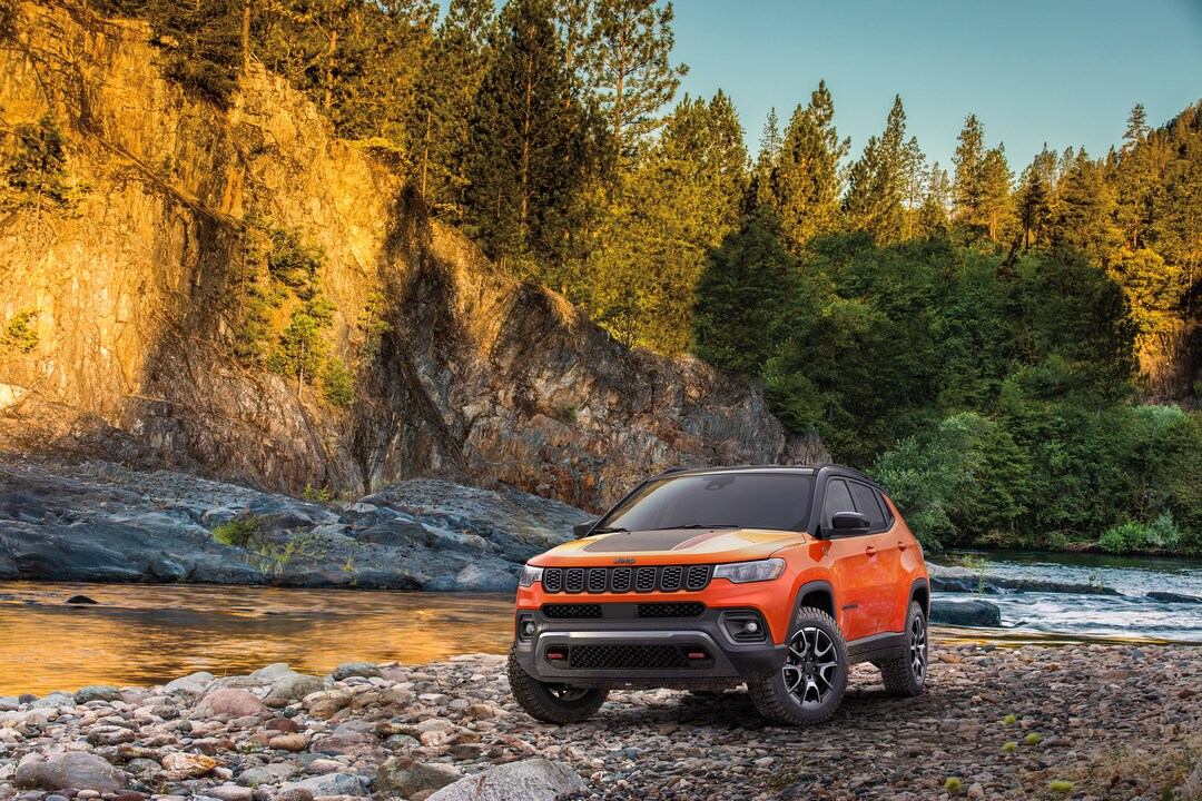  Person cheerfully signing documents.