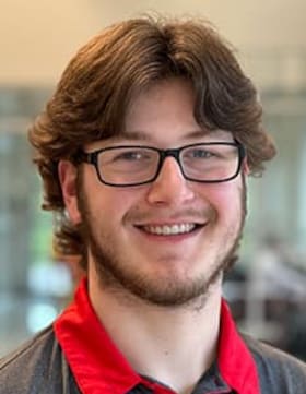 Staff member Logan Brill from ID_00d1a407b8e9