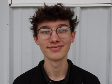 Staff member Evan Andros from 26cd99dd1f17