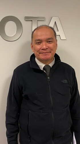 Staff member John Decepida from ID_003287c3ff43