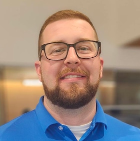 Staff member Tanner West from ID_56e878a4fc26