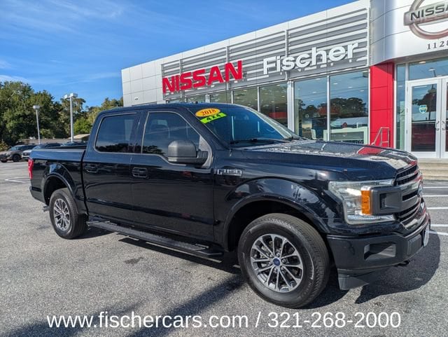 Used 2018 Ford F-150 XLT with VIN 1FTEW1EP5JKD00879 for sale in Titusville, FL