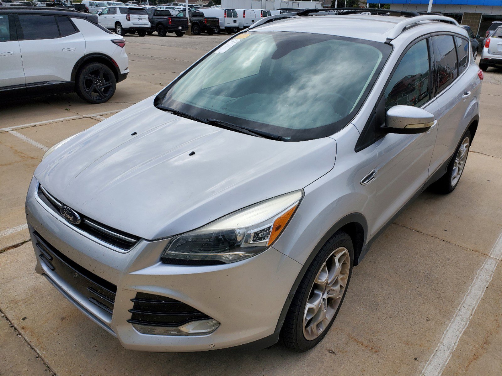 Used 2013 Ford Escape Titanium with VIN 1FMCU0J96DUC60069 for sale in Cedar Rapids, IA