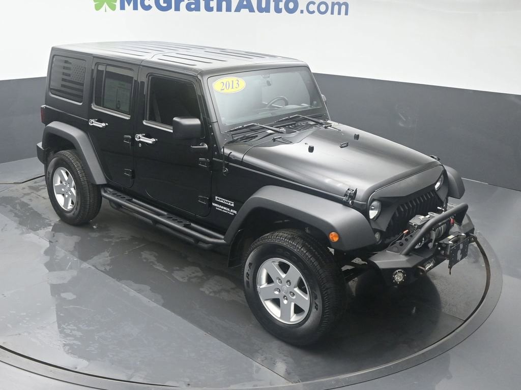Used 2013 Jeep Wrangler Unlimited Sport with VIN 1C4BJWDG7DL504792 for sale in Cedar Rapids, IA