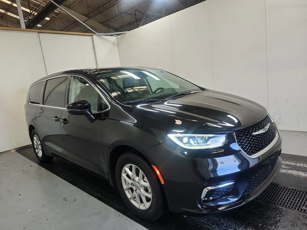 Used 2023 Chrysler Pacifica Touring L with VIN 2C4RC1BG3PR628309 for sale in Cedar Rapids, IA
