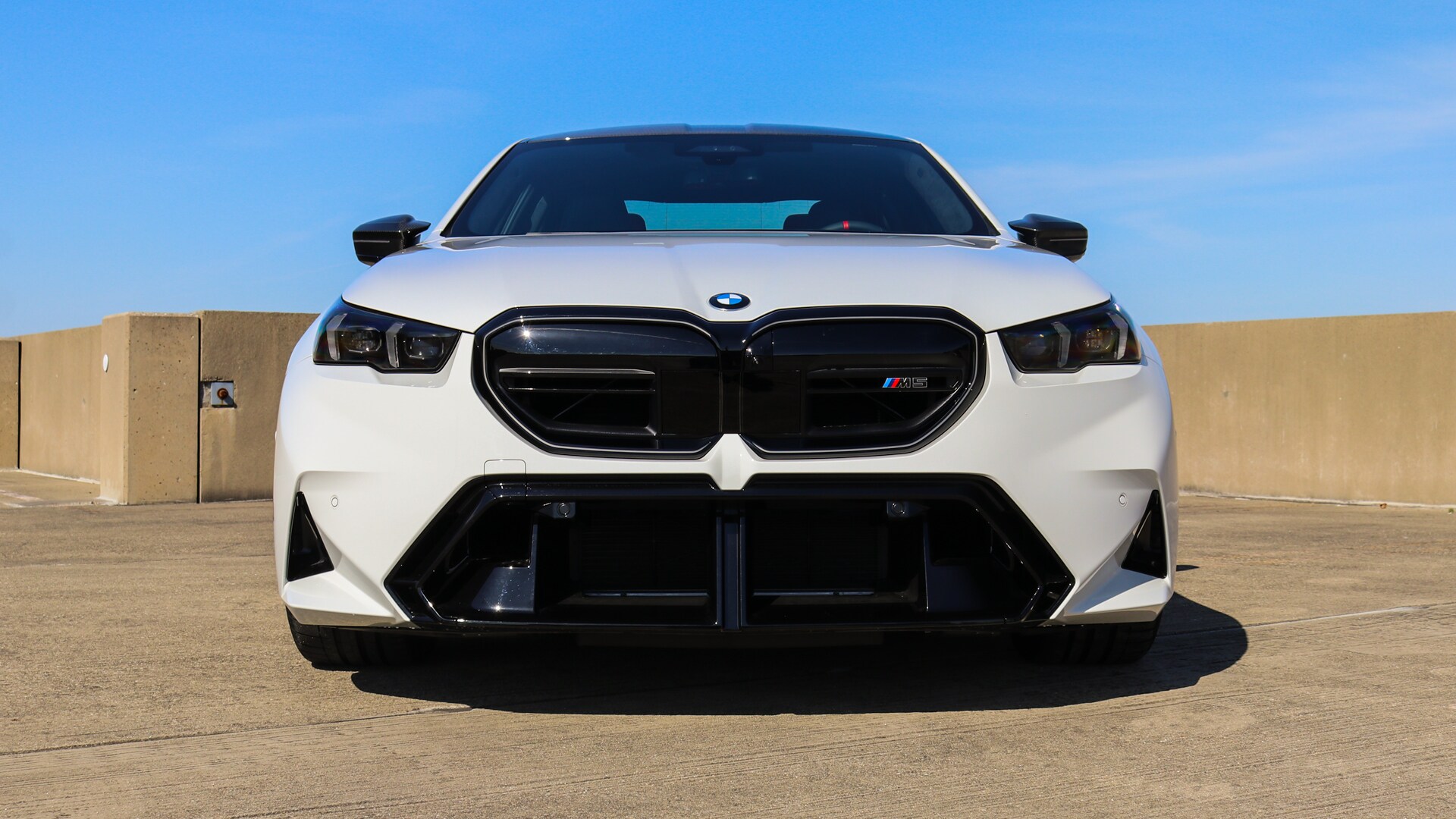 Close-up of the 2026 BMW M5 kidney grille at Patrick BMW, featuring the bold, signature BMW design with dynamic contours and high-performance styling.
