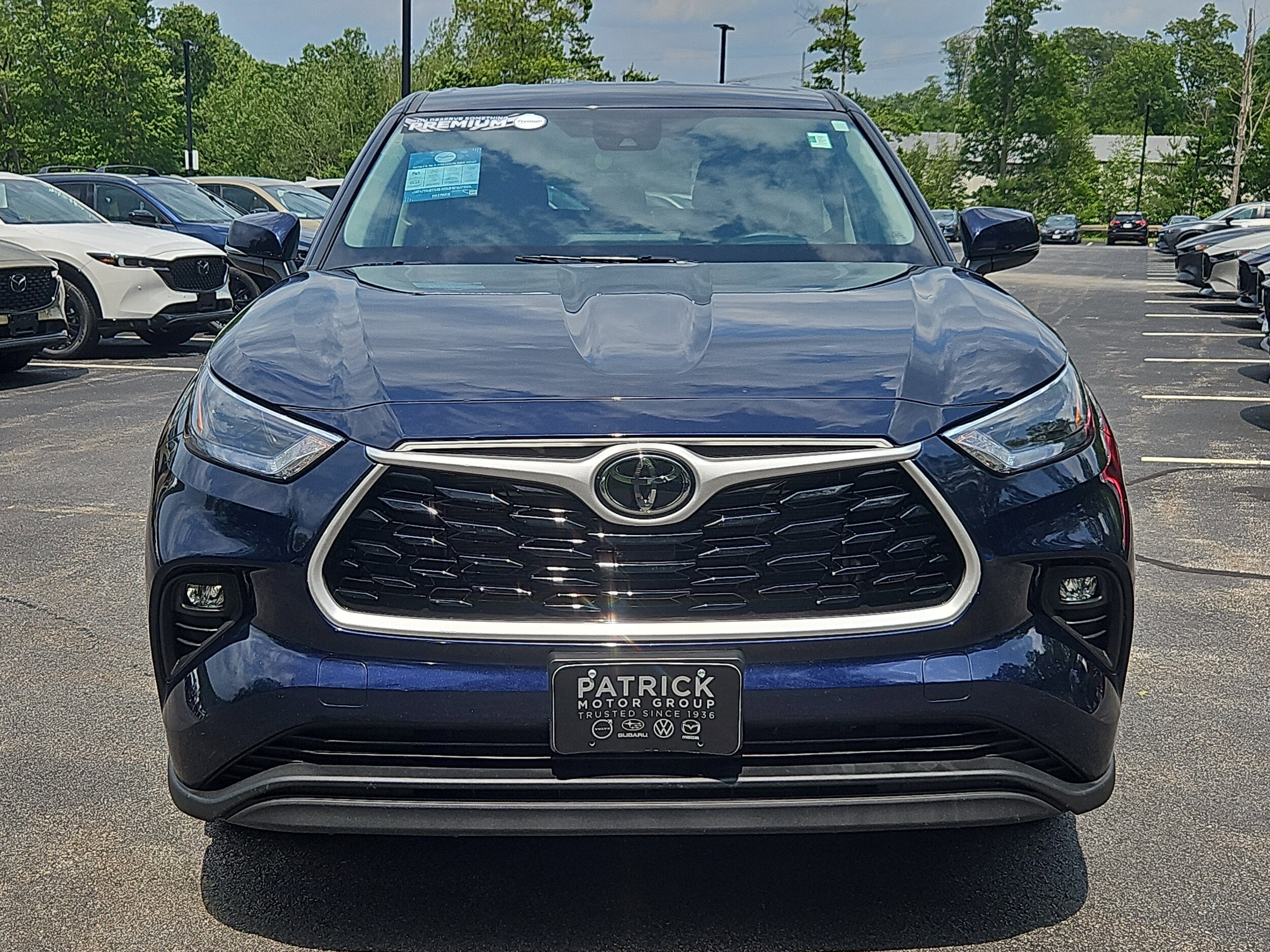 Used 2022 Toyota Highlander LE with VIN 5TDBZRBH4NS222423 for sale in Auburn, MA