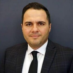 Staff member Tommy Pililimis from ID_aaa4e273c8c9