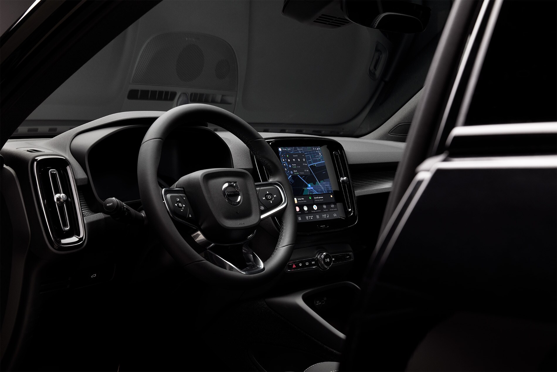 Interior view of the 2025 Volvo XC40 showcasing its minimalist Scandinavian design, premium materials, digital driver display, and spacious cabin layout.