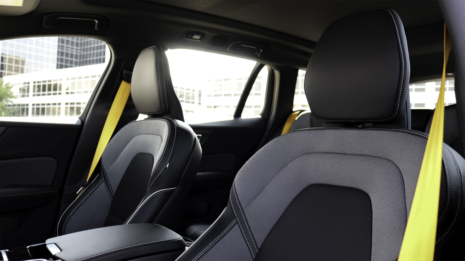2025 Volvo V60 Cross Country interior showcasing premium materials, spacious seating, a panoramic sunroof, and a minimalist dashboard with a central touchscreen display.