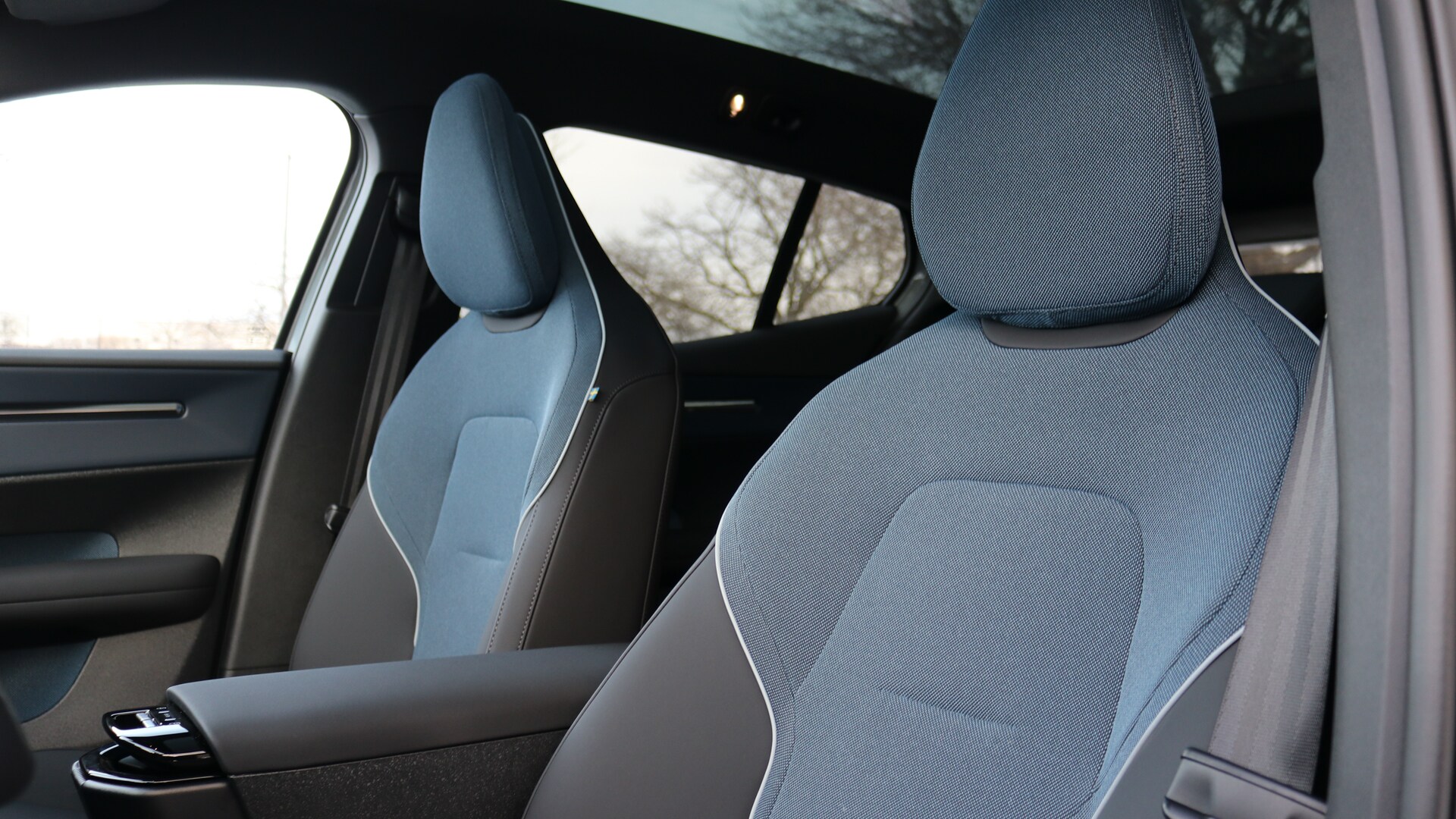 2025 Volvo EX30 interior showcasing modern design, customizable driver interface, and advanced technology features.