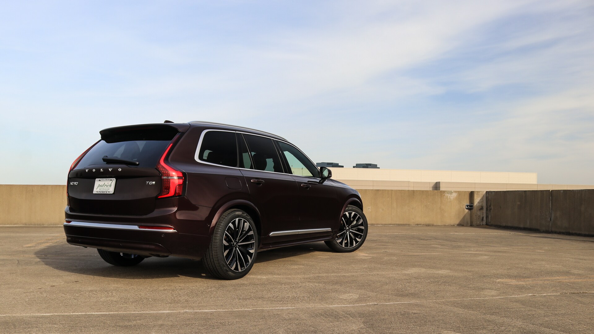 Rear view of the 2025.5 Volvo XC90 Plug-In Hybrid showcasing sleek taillights, sculpted tailgate, and modern Scandinavian design