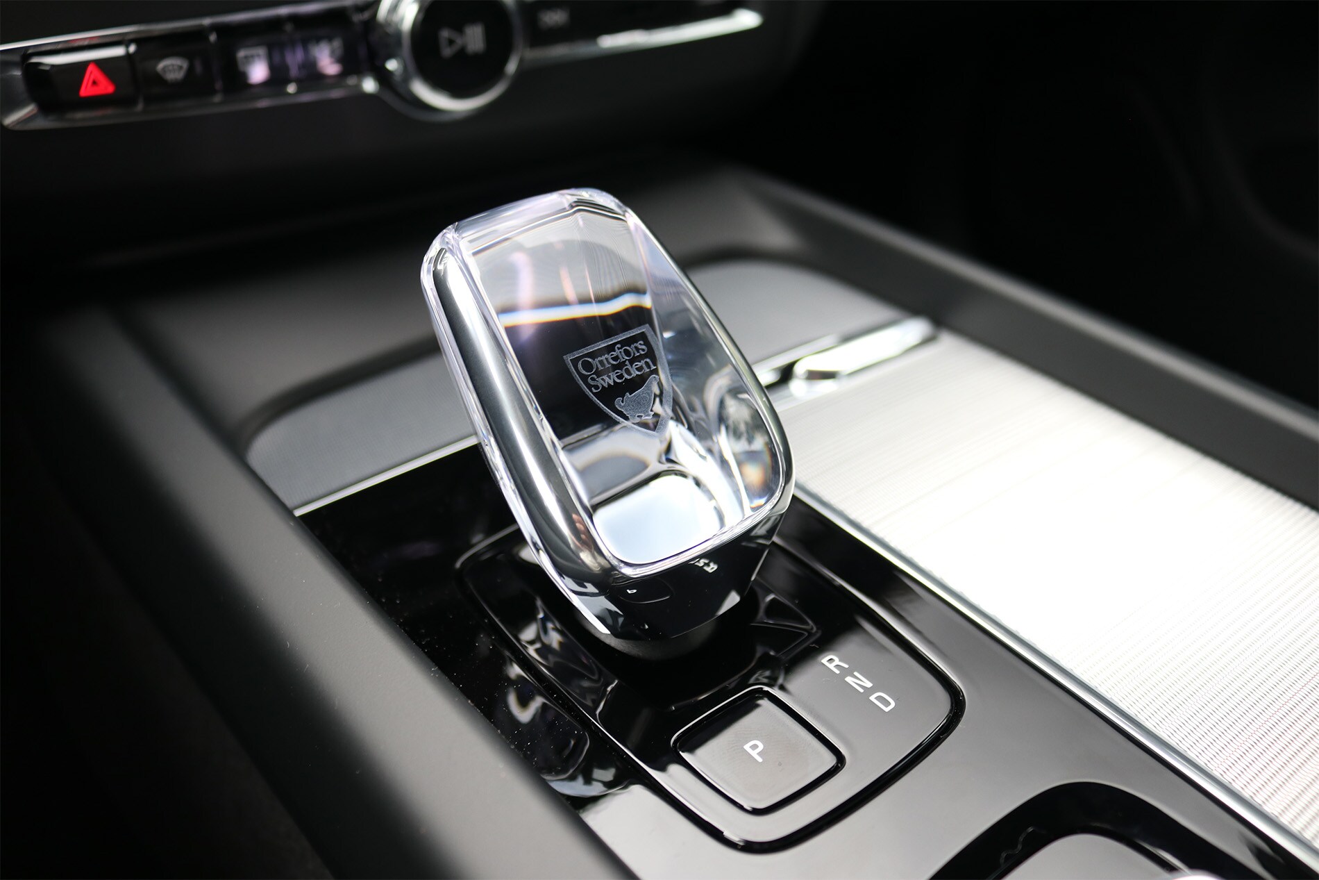 2025 Volvo XC60 Plug-in Hybrid interior featuring premium materials, a modern dashboard with a large touchscreen display, and spacious seating for five.