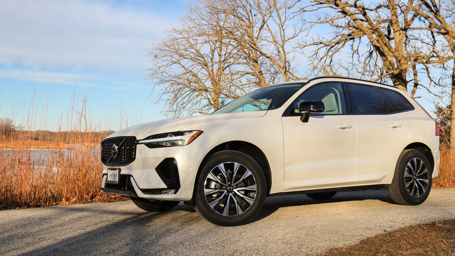 A bold and elegant design showcasing the signature Volvo grille, sleek LED headlights, and a refined front bumper. The XC60 exudes a premium, modern aesthetic with a strong, confident presence on the road