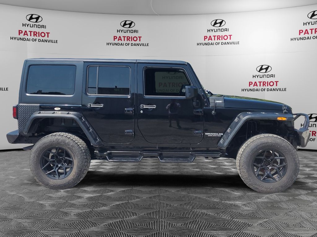 Used 2014 Jeep Wrangler Unlimited Sport with VIN 1C4BJWDG0EL281478 for sale in Danville, IL