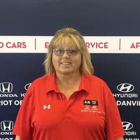 Staff member Sarah Smith from ID_4ae24f958211