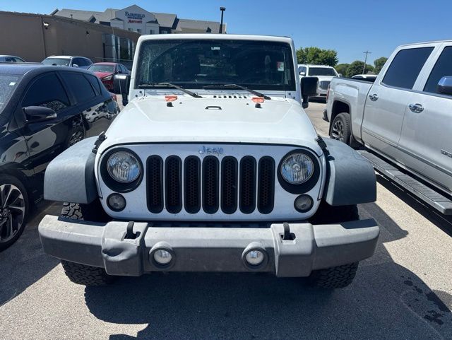 Used 2015 Jeep Wrangler Unlimited Sport with VIN 1C4BJWDGXFL570496 for sale in Bartlesville, OK