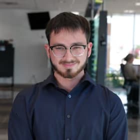 Staff member Caleb Peck from ID_a4e809