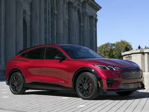 A%20red%20car%20parked%20in%20front%20of%20a%20building.jpg
