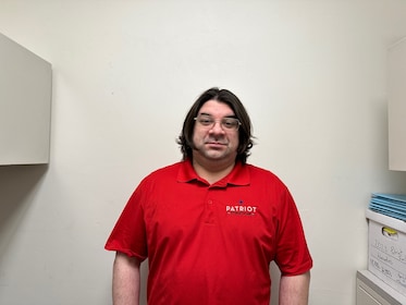 Staff member Jesse Eveler from e2e0f21325a0