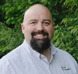 Staff member Corey Creteau from 6a5b5940cd18