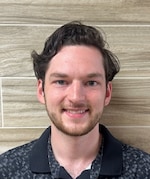 Staff member Daniel Burch from ID_a89b593ec816