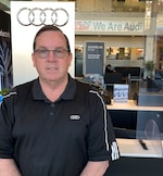 Staff member John Regan from ID_1a3047ed7096