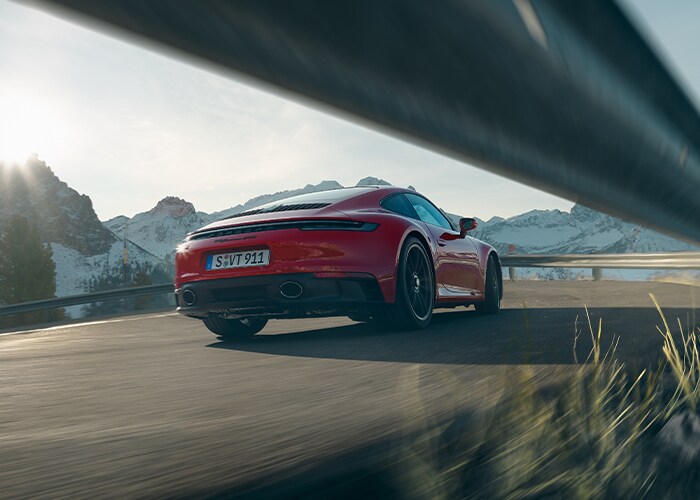 2025 Porsche 911 driving on highway