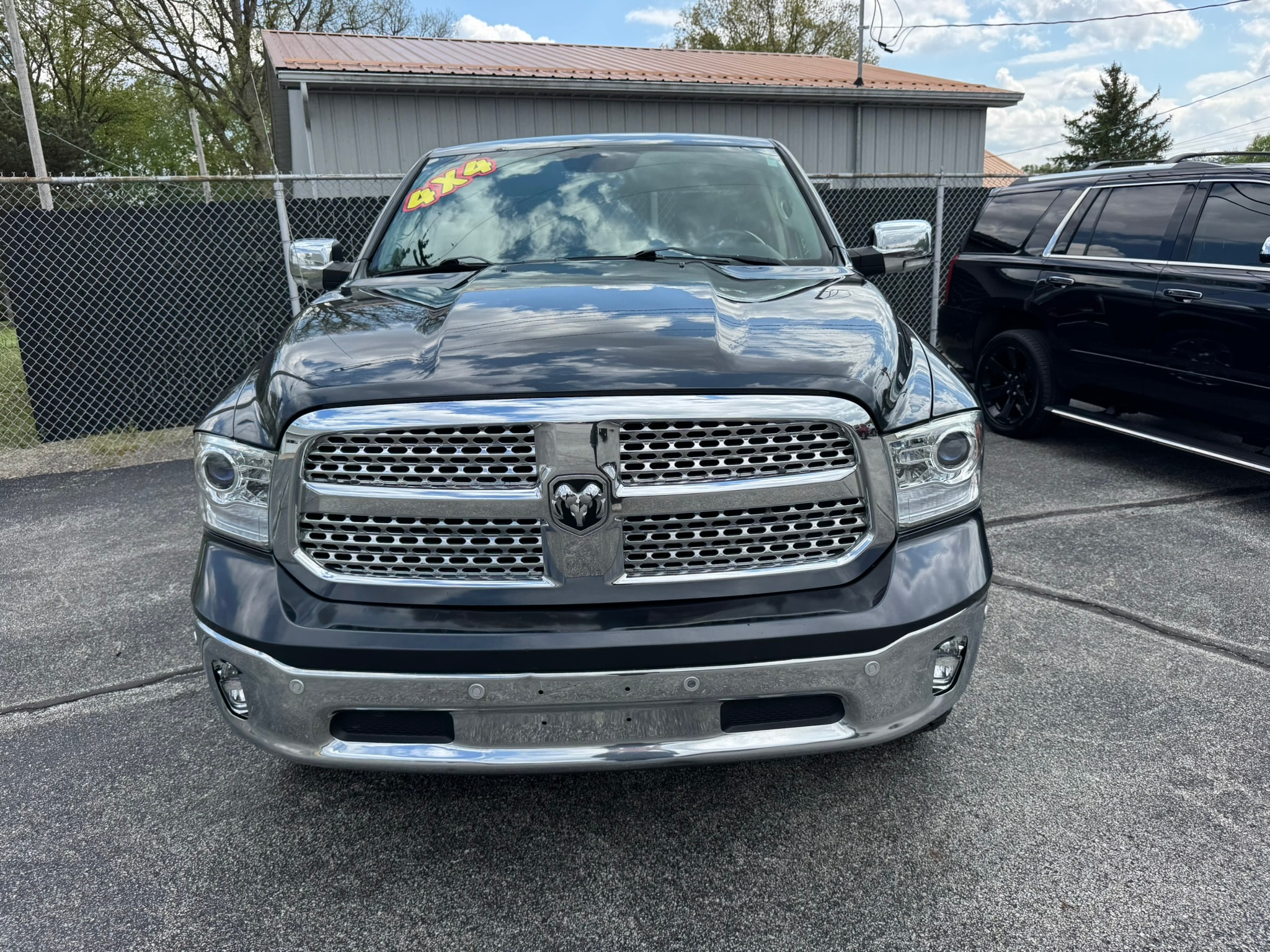 Used 2014 RAM Ram 1500 Pickup Laramie with VIN 1C6RR7NT6ES360465 for sale in Peru, IN