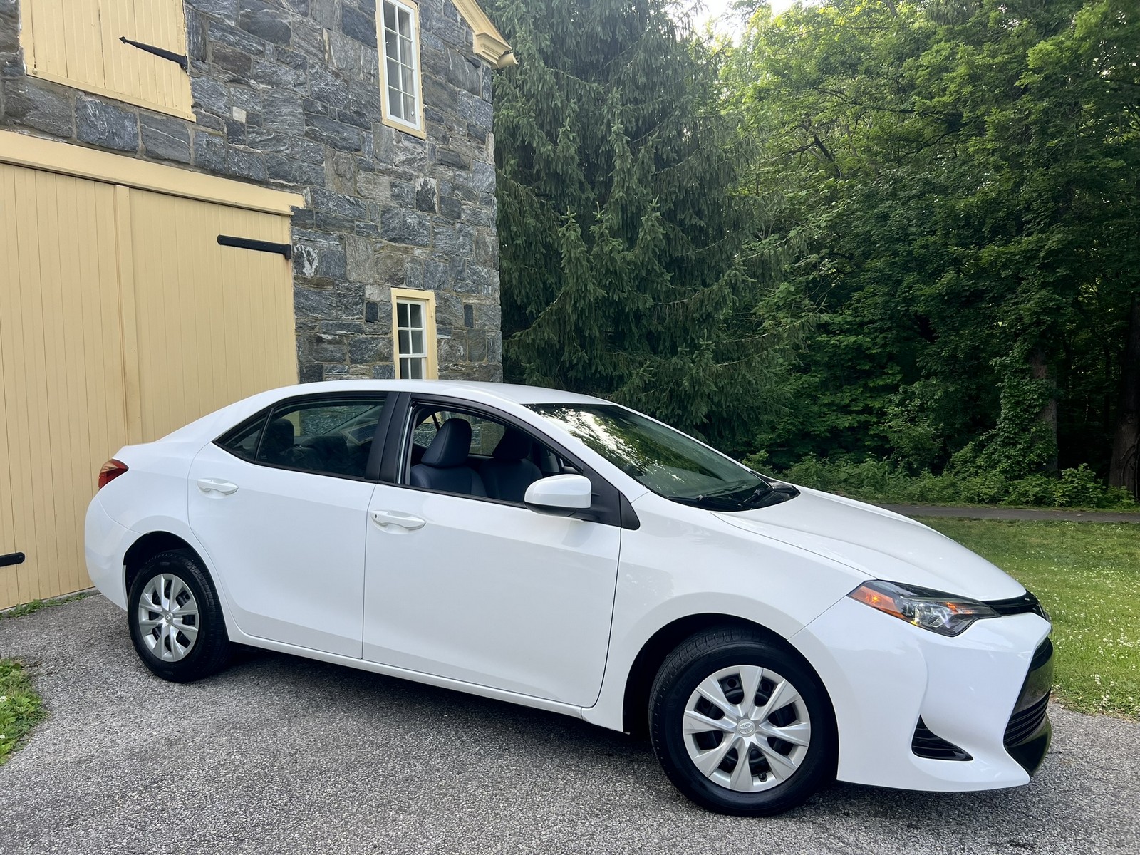 Super White 2017 Toyota Corolla Sedan  Continuously Variable Transmission