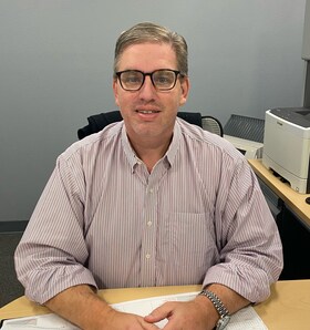 Staff member CYRUS BARGER from e50de6845d56