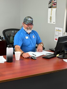 Staff member Brian Reed from 878cef3769b0