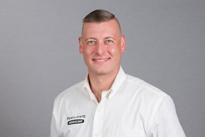 Staff member Alex Guyton from ID_56e7f469cf12