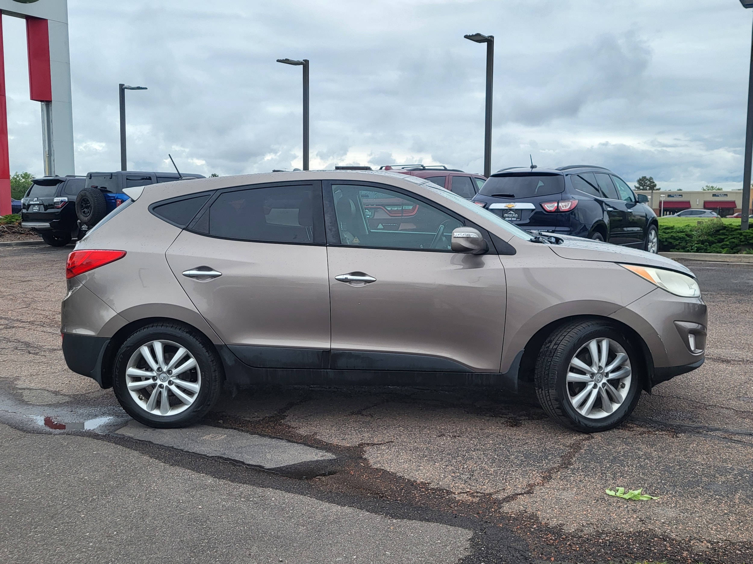 Used 2013 Hyundai Tucson Limited with VIN KM8JUCAC4DU604812 for sale in Littleton, CO