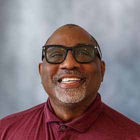 Staff member George Best III from ID_7dacc1f971f1