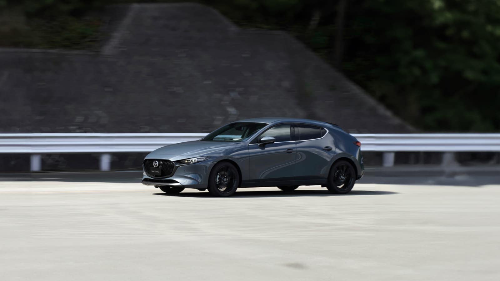 2025-mazda3-hatchback-cruising.png