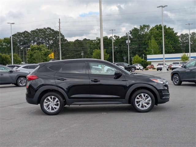 Used 2021 Hyundai Tucson SE with VIN KM8J23A4XMU336881 for sale in Greenville, NC