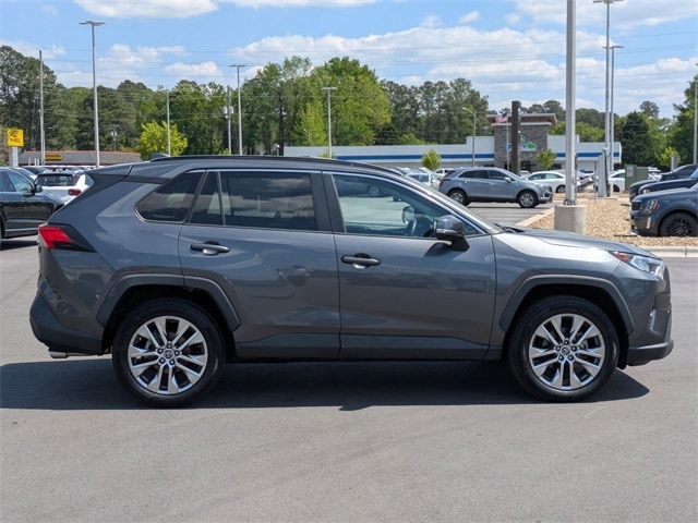 Used 2021 Toyota RAV4 XLE Premium with VIN 2T3C1RFV2MC095259 for sale in Greenville, NC