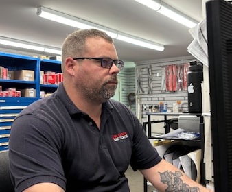 Staff member Andrew Ouellette from c55005a26fb7