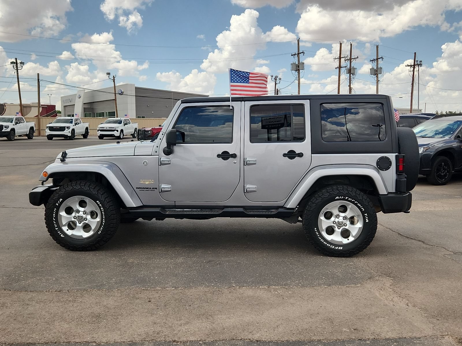 Used 2014 Jeep Wrangler Unlimited Sahara with VIN 1C4BJWEG2EL132455 for sale in Clovis, NM
