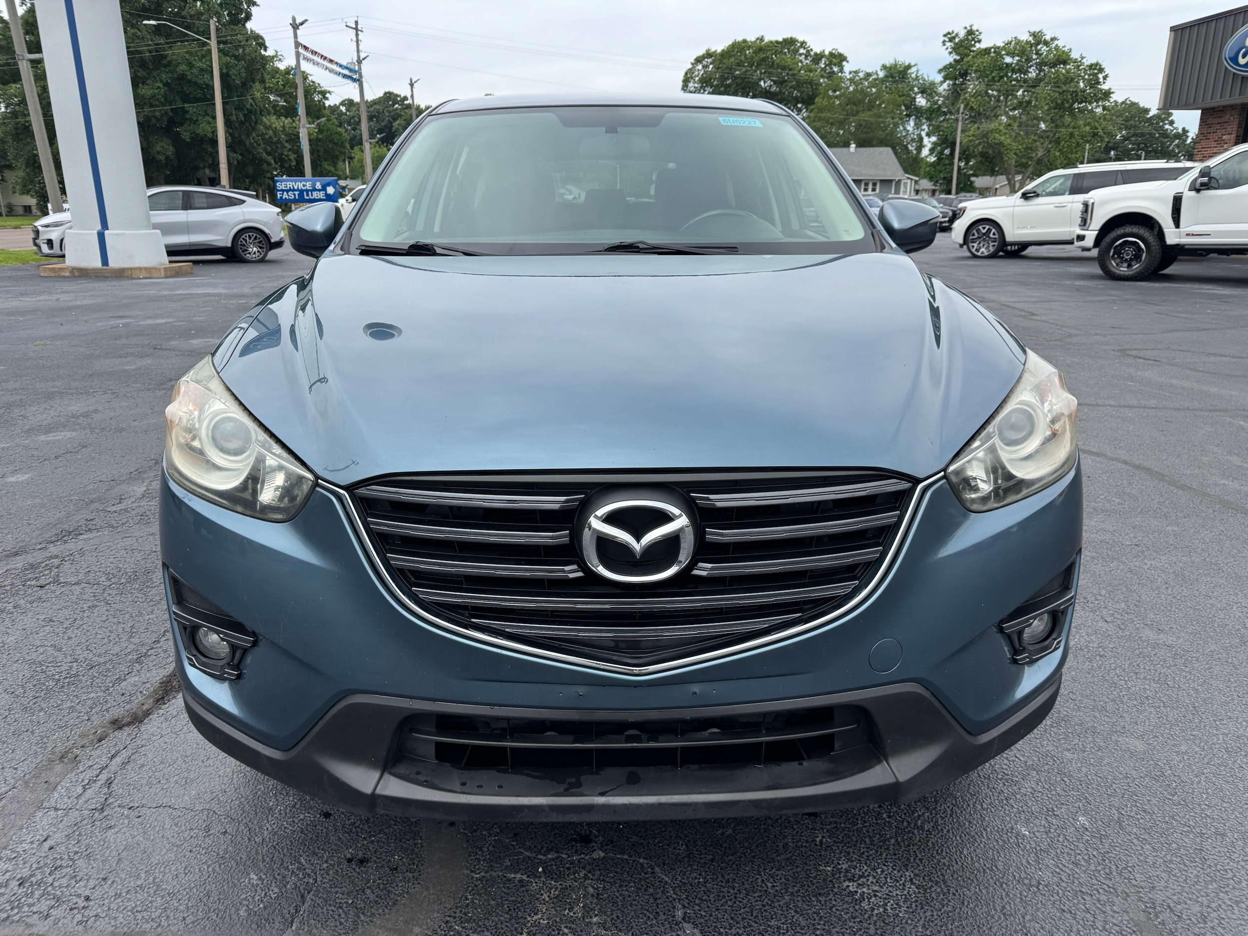 Used 2016 Mazda CX-5 Touring with VIN JM3KE2CY4G0654346 for sale in Centralia, IL