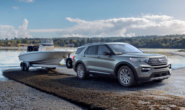 2022 Ford Explorer exterior towing boat by water