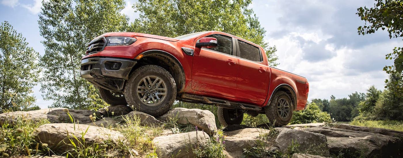 Red 2021 Ford Ranger parked off-road.