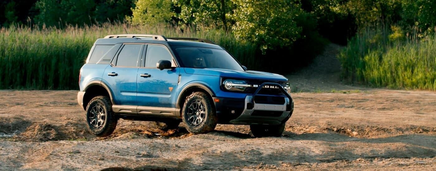 A blue 2025 Ford Bronco Sport from the side.