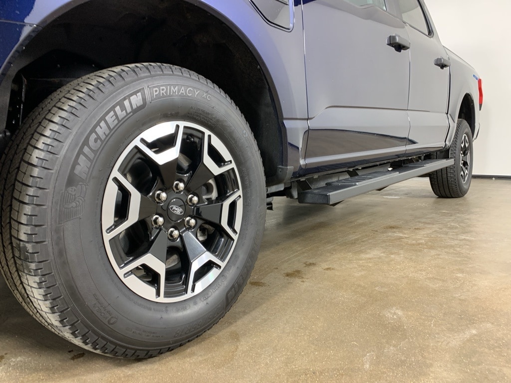 Used 2023 Ford F-150 Lightning Pro with VIN 1FTVW1EL3PWG57542 for sale in Peoria, IL