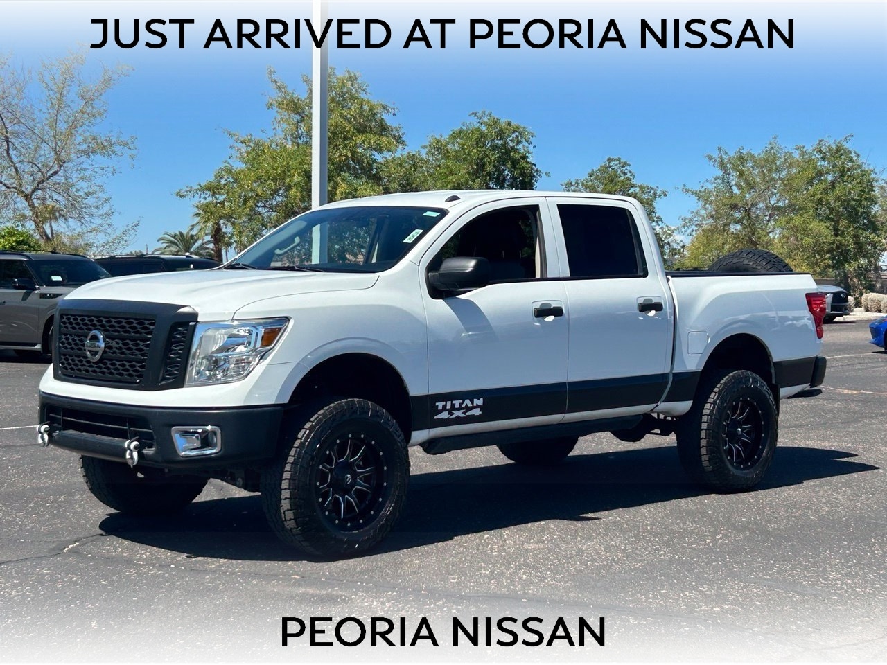 Glacier White 2019 Nissan Titan Pickup Truck Four-Wheel Drive 7-Speed Automatic